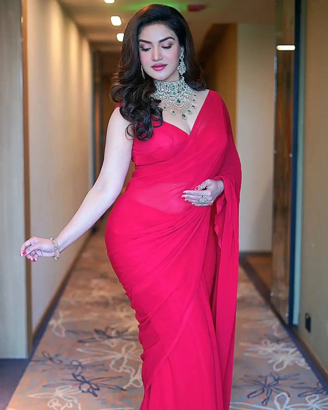 BEAUTIFUL INDIAN GIRL HONEY ROSE IMAGES IN SLEEVELESS RED SAREE 3